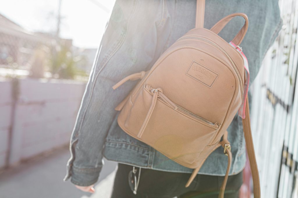 Photo by Simona Sergi on Unsplash (what a woman carries in her bag)